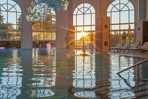 Indoor pool, outdoor pool, pool umbrellas, sun loungers