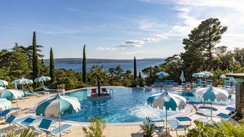 Indoor pool, outdoor pool, pool umbrellas, sun loungers