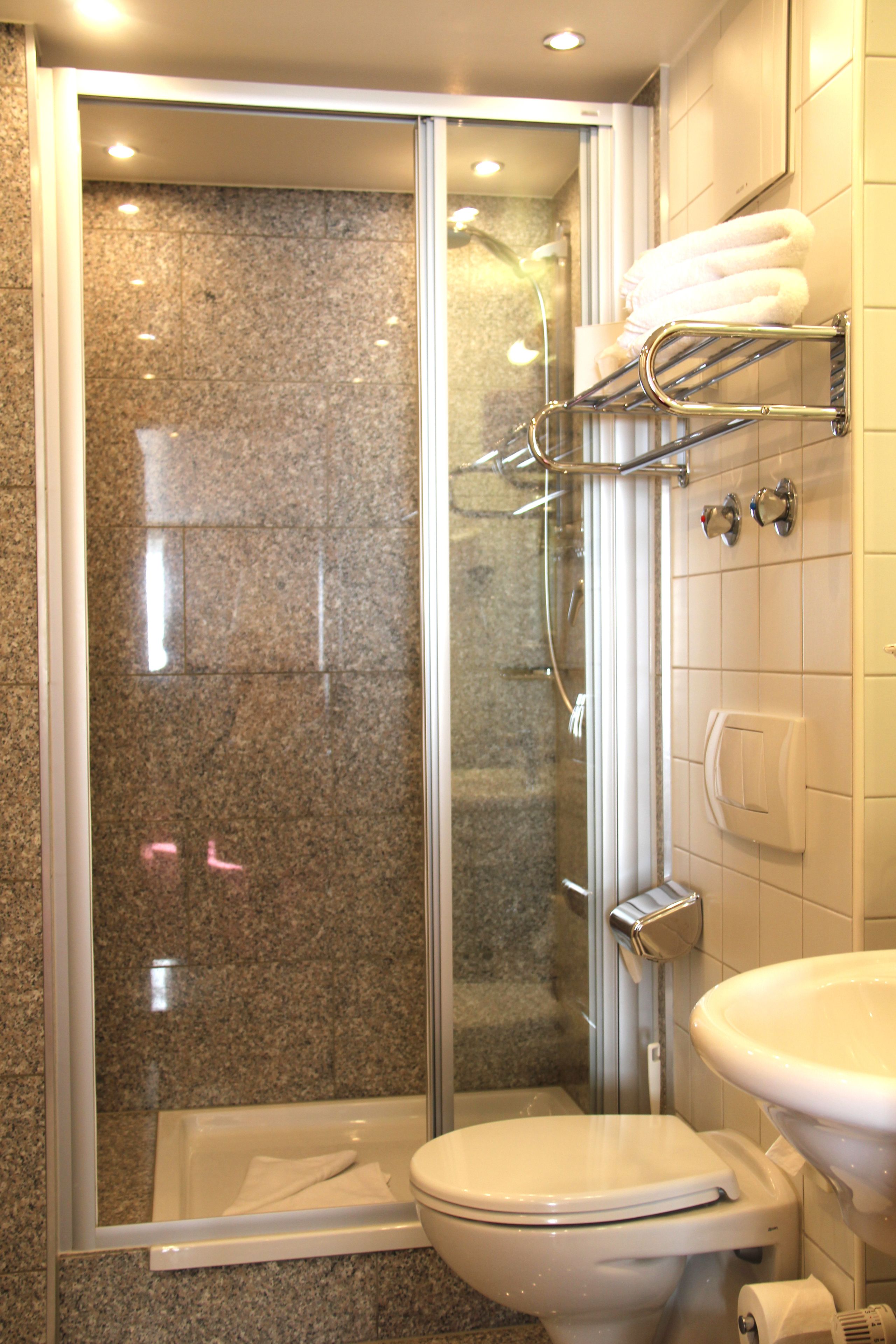 standard single room | bathroom | shower, free toiletries, hair dryer, bathrobes