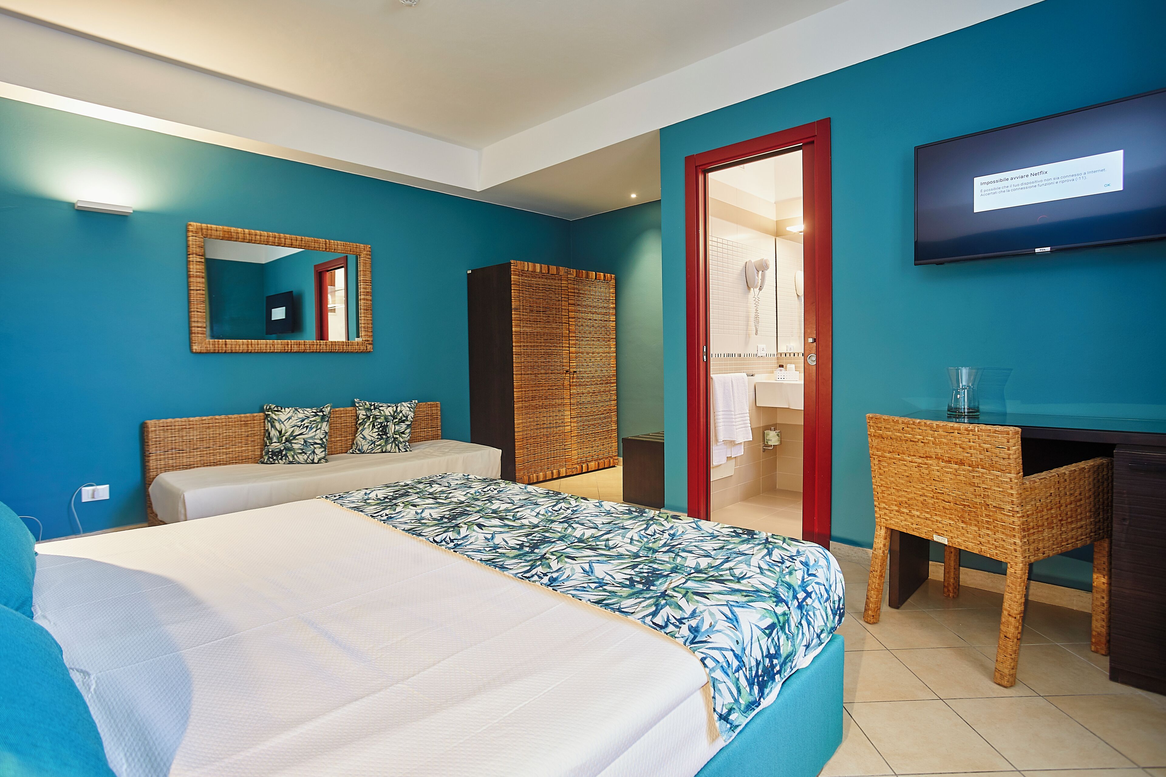 Triple Room | Minibar, in-room safe, desk, soundproofing