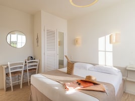 Select Comfort beds, desk, blackout curtains, soundproofing