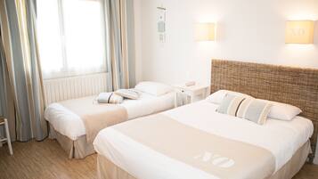 Select Comfort beds, desk, blackout curtains, soundproofing