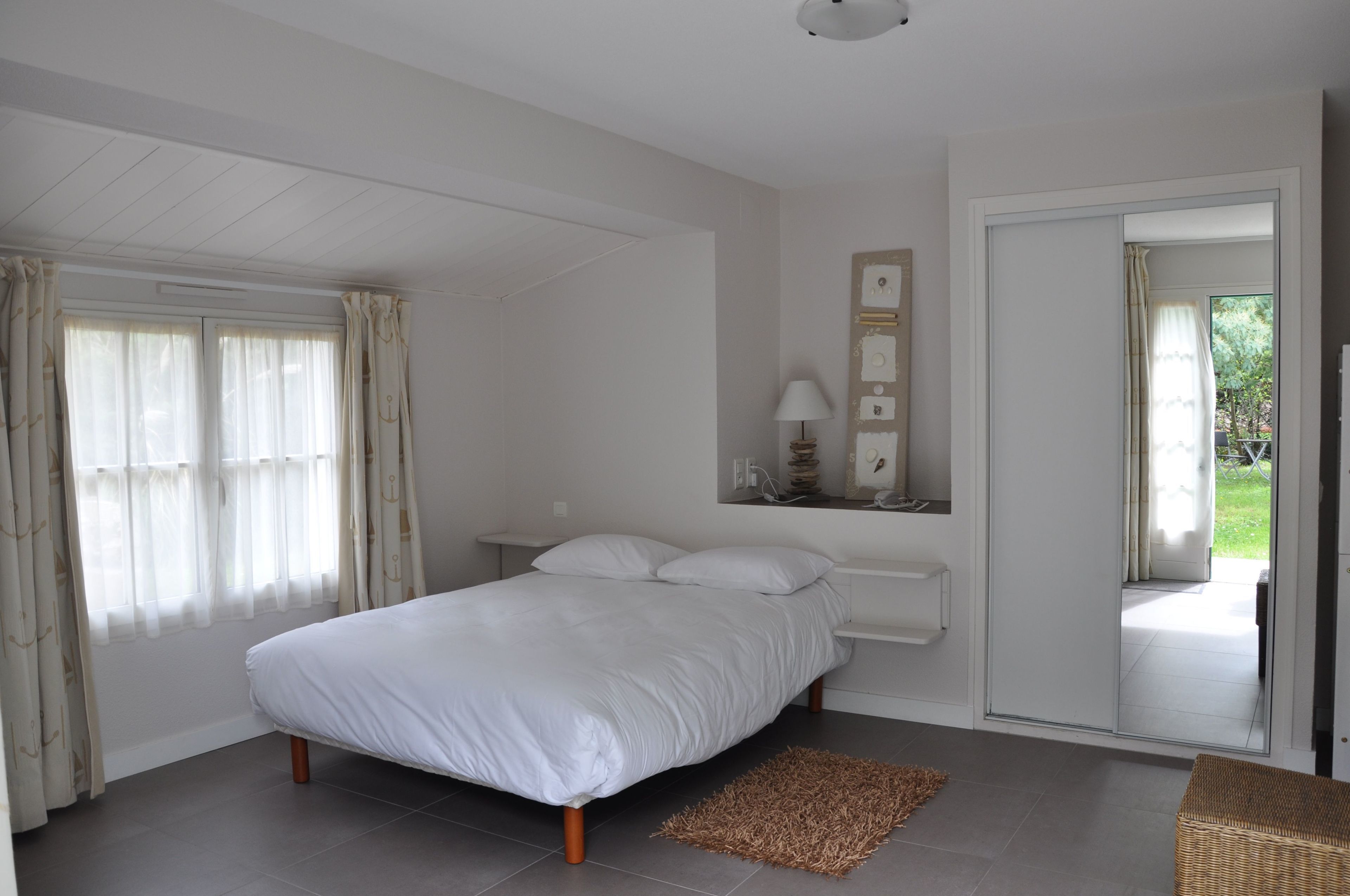 quadruple room | select comfort beds, desk, blackout curtains, soundproofing