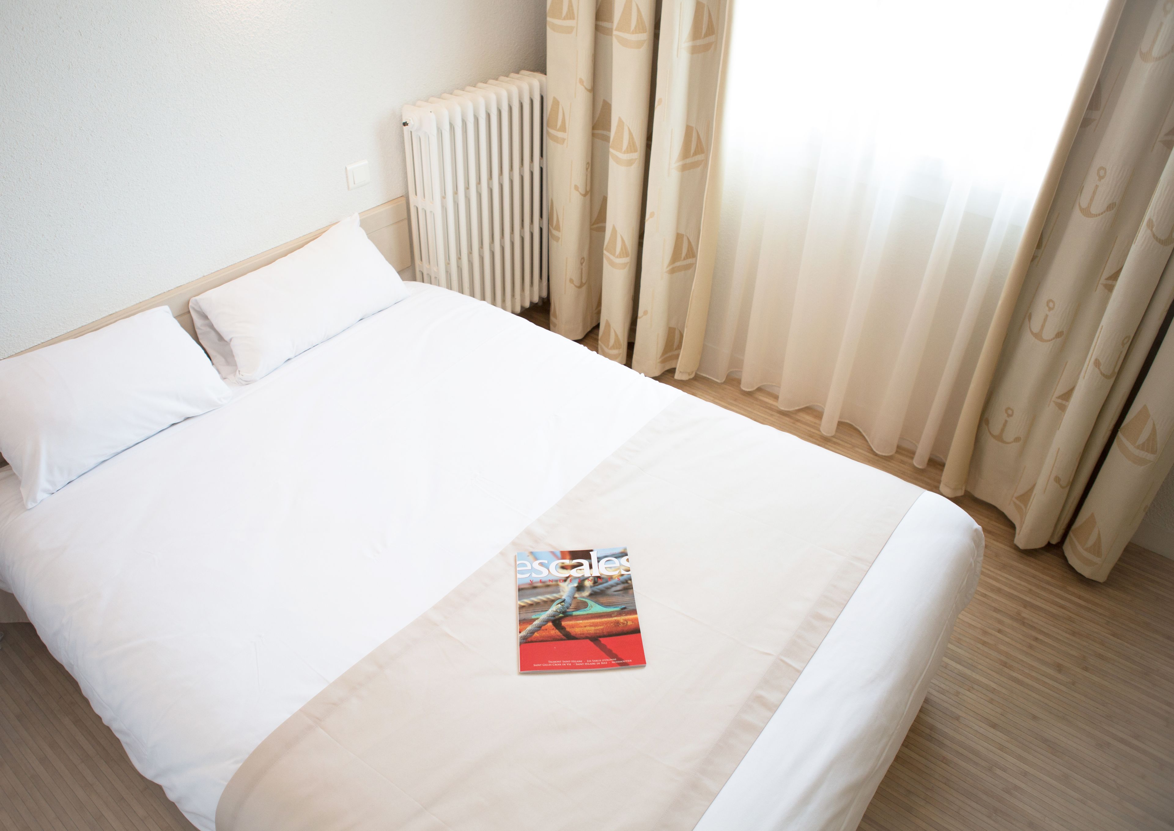 comfort double room | select comfort beds, desk, blackout curtains, soundproofing