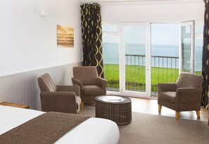 Comfort Suite, 2 Bedrooms, Sea View | In-room safe, desk, iron/ironing board, free WiFi