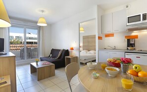 Appartement 1 chambre 4 personnes | Restauration dans la chambre