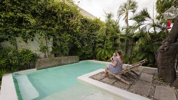 Outdoor pool, open 8:00 AM to 10:00 PM, sun loungers