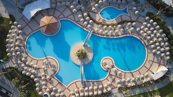 Indoor pool, seasonal outdoor pool, open 10 AM to 6 PM, pool umbrellas