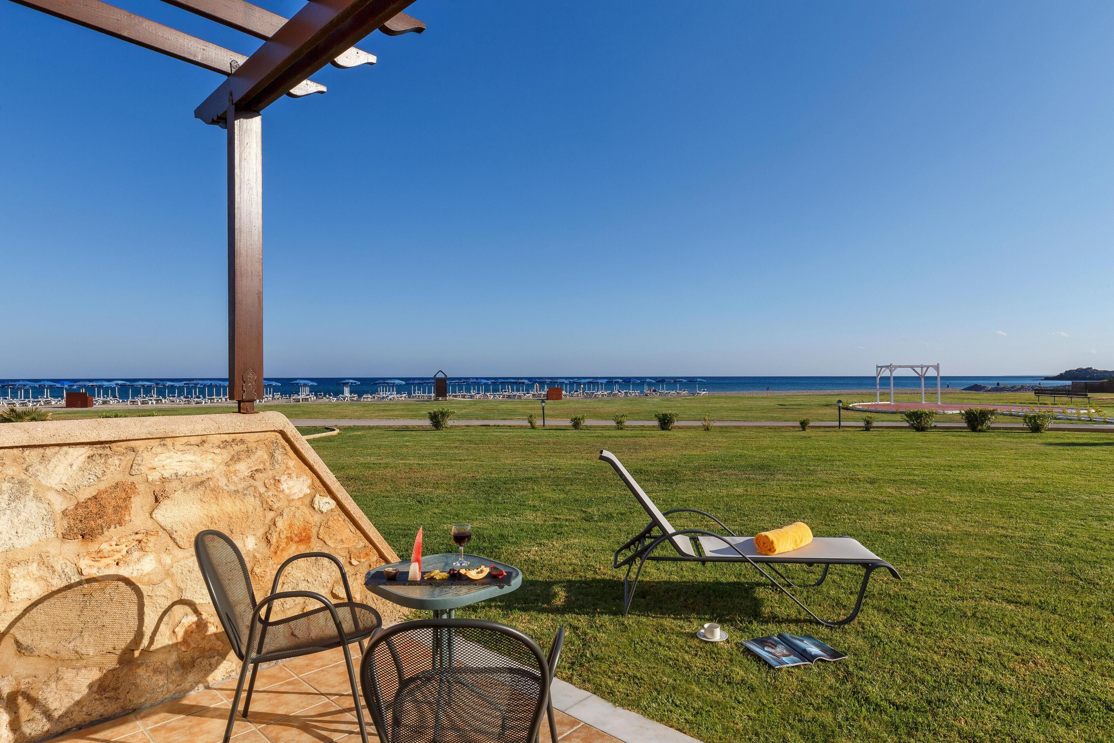 Superior Room, Beachfront | Free minibar, in-room safe, desk, blackout drapes