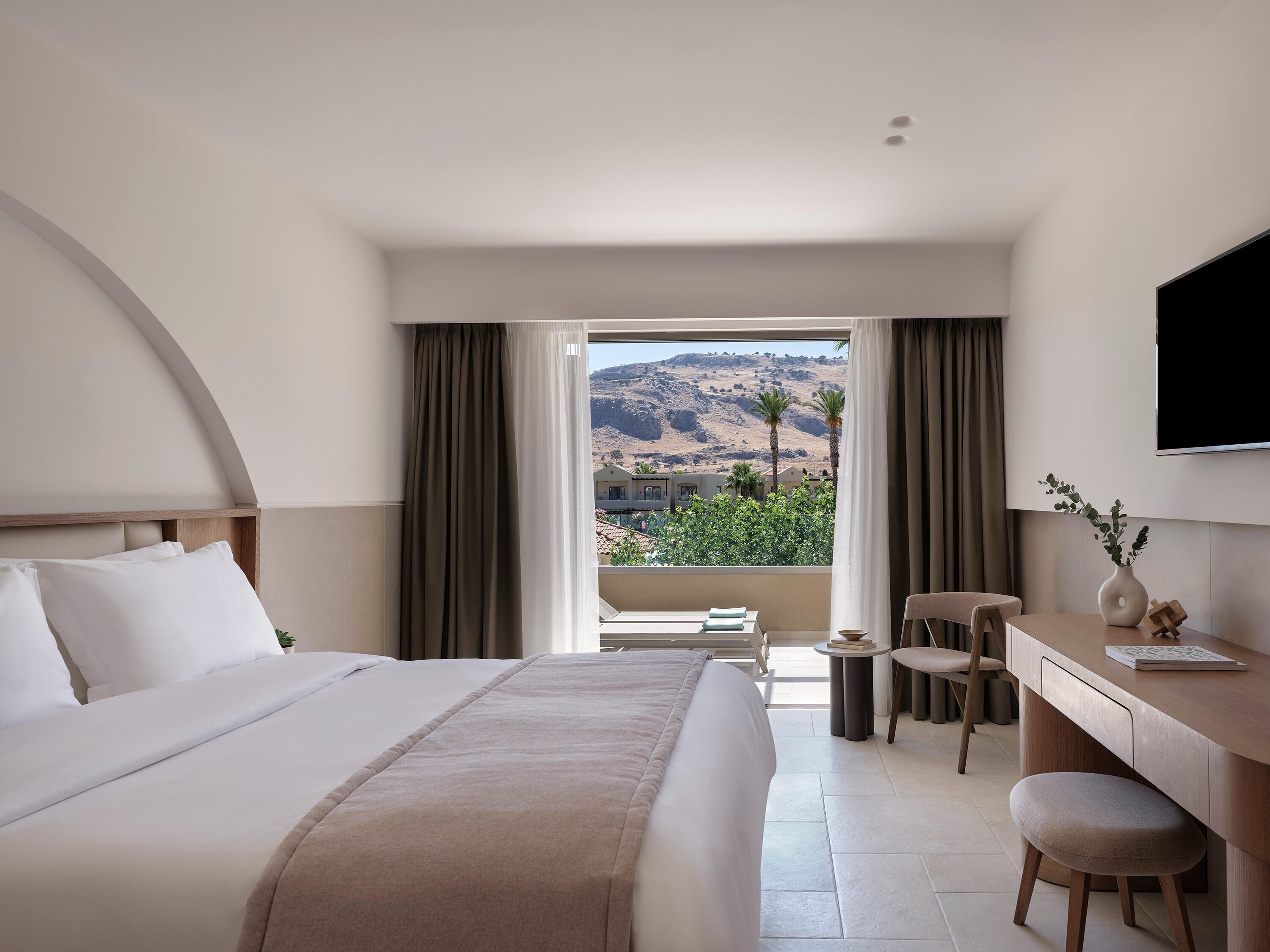 Free minibar, in-room safe, desk, blackout drapes