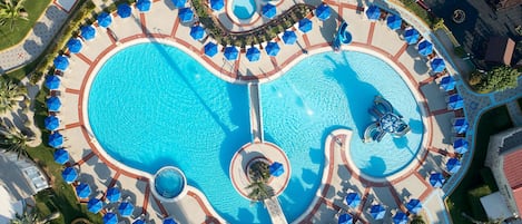 Indoor pool, seasonal outdoor pool, open 10 AM to 6 PM, pool umbrellas