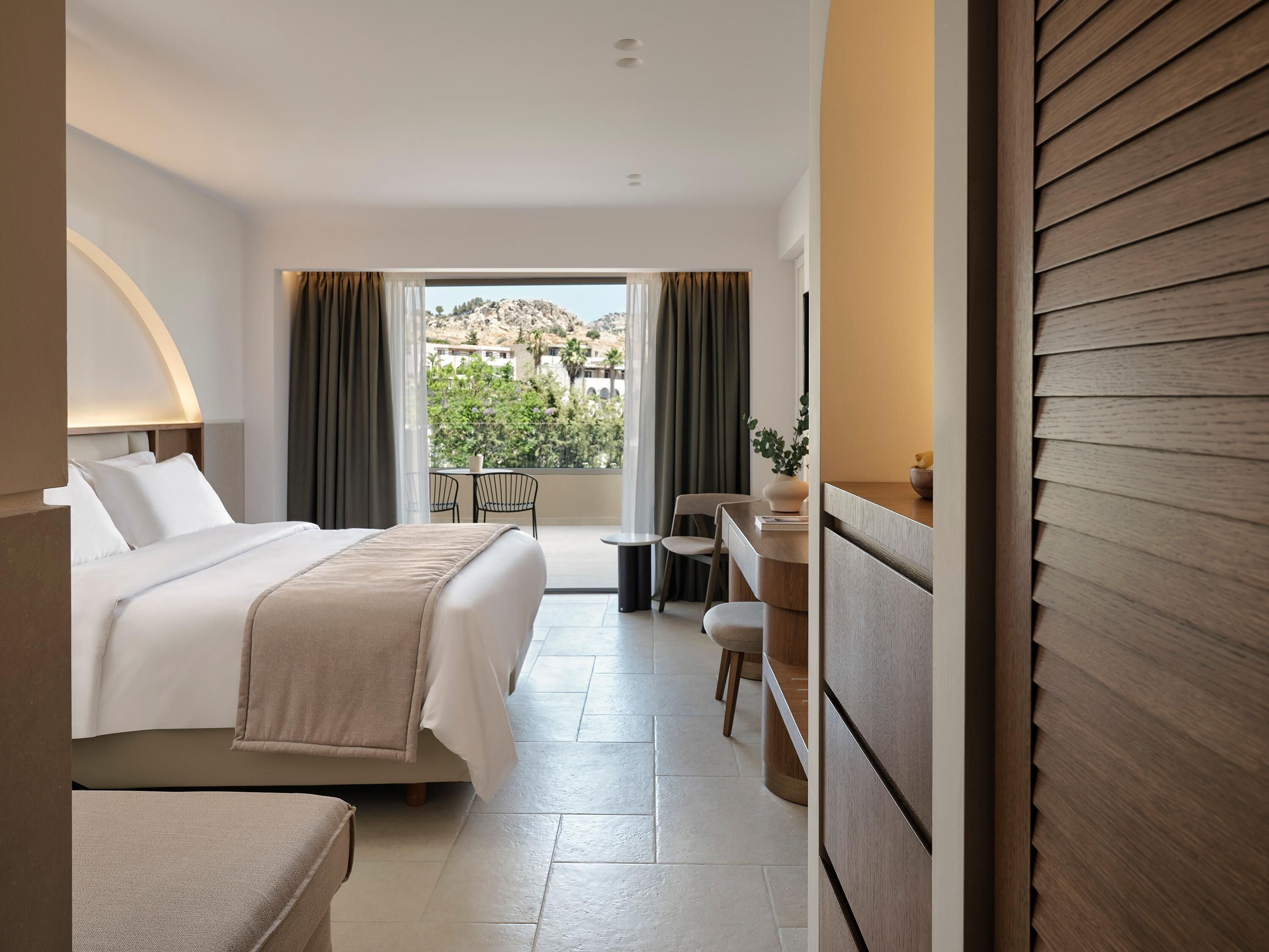 Double Room, Garden View | Free minibar, in-room safe, desk, blackout drapes