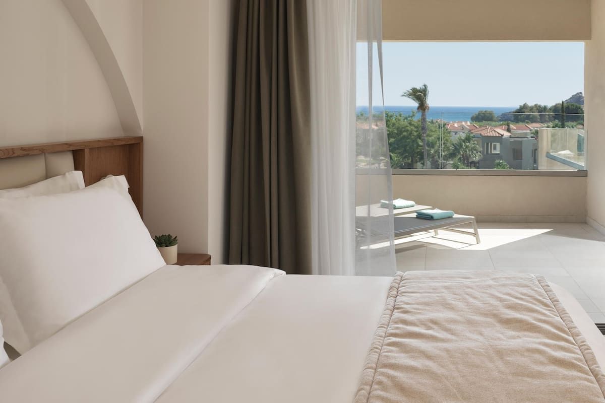 Double or Twin Room, Sea View | Free minibar, in-room safe, desk, blackout drapes