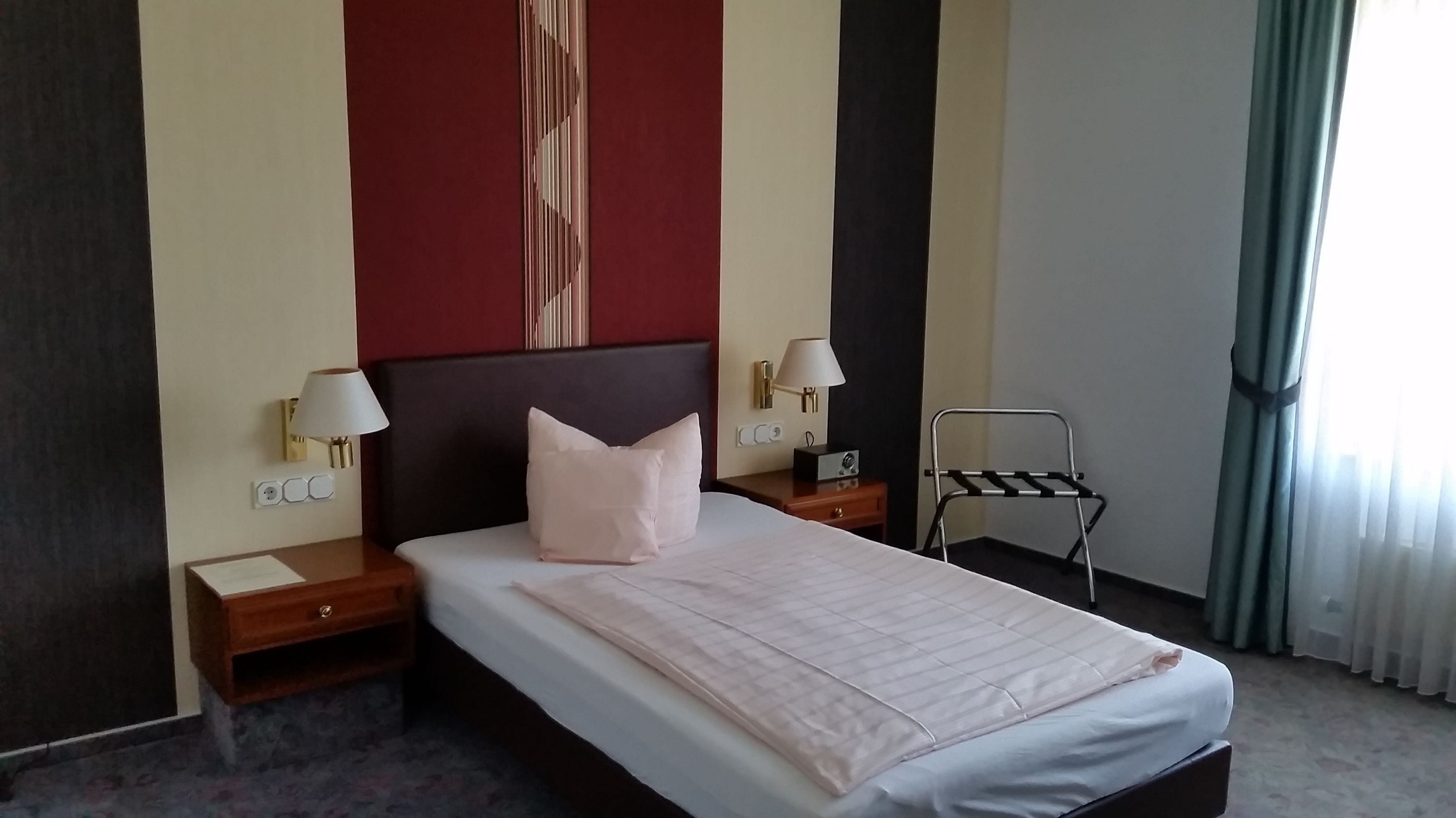 single room | in-room safe, desk, iron/ironing board, rollaway beds
