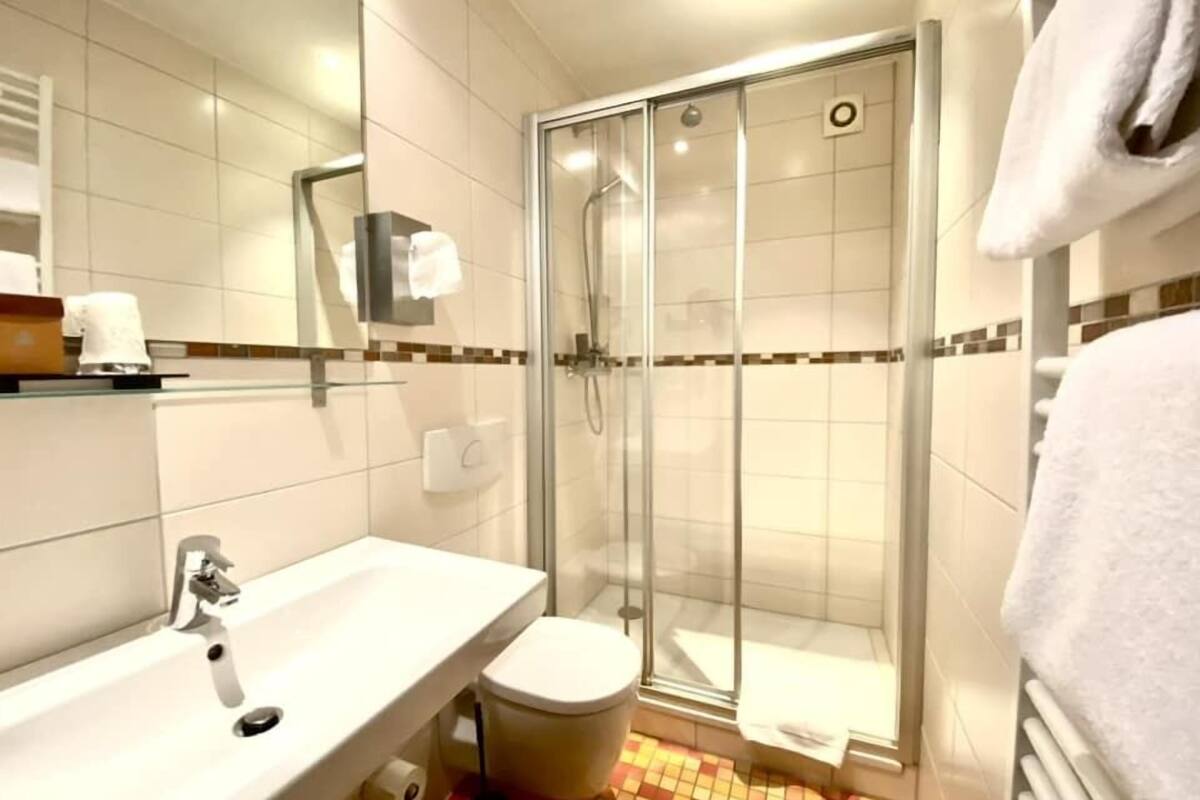 deluxe double room, 1 king bed, non smoking (with air condition) | bathroom | shower, rainfall showerhead, eco-friendly toiletries, hair dryer