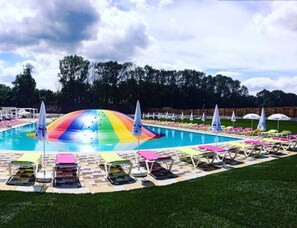 3 outdoor pools, open 8 AM to 8 PM, pool umbrellas, sun loungers