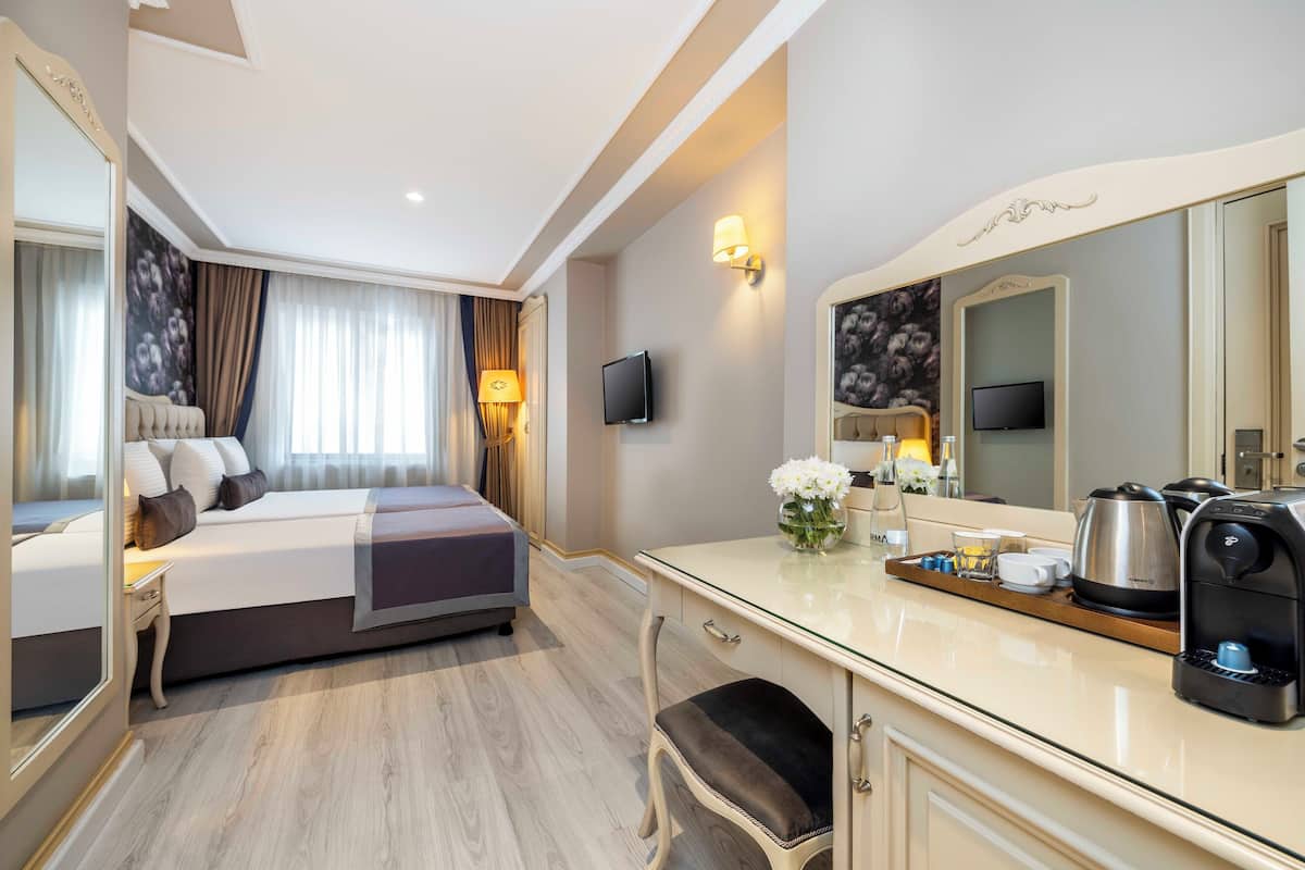 Standard Triple Room | In-room safe, desk, blackout drapes, soundproofing