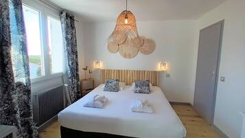 Familien-Suite, Gartenblick | Hochwertige Bettwaren, Zimmersafe, individuell dekoriert