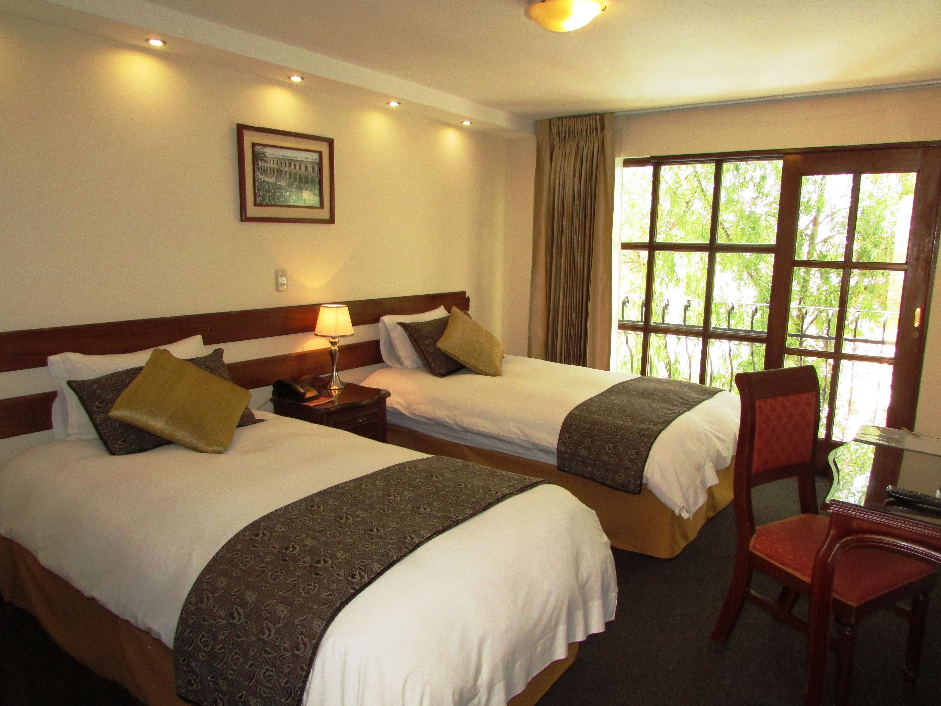 business double room | down duvets, minibar, in-room safe, desk