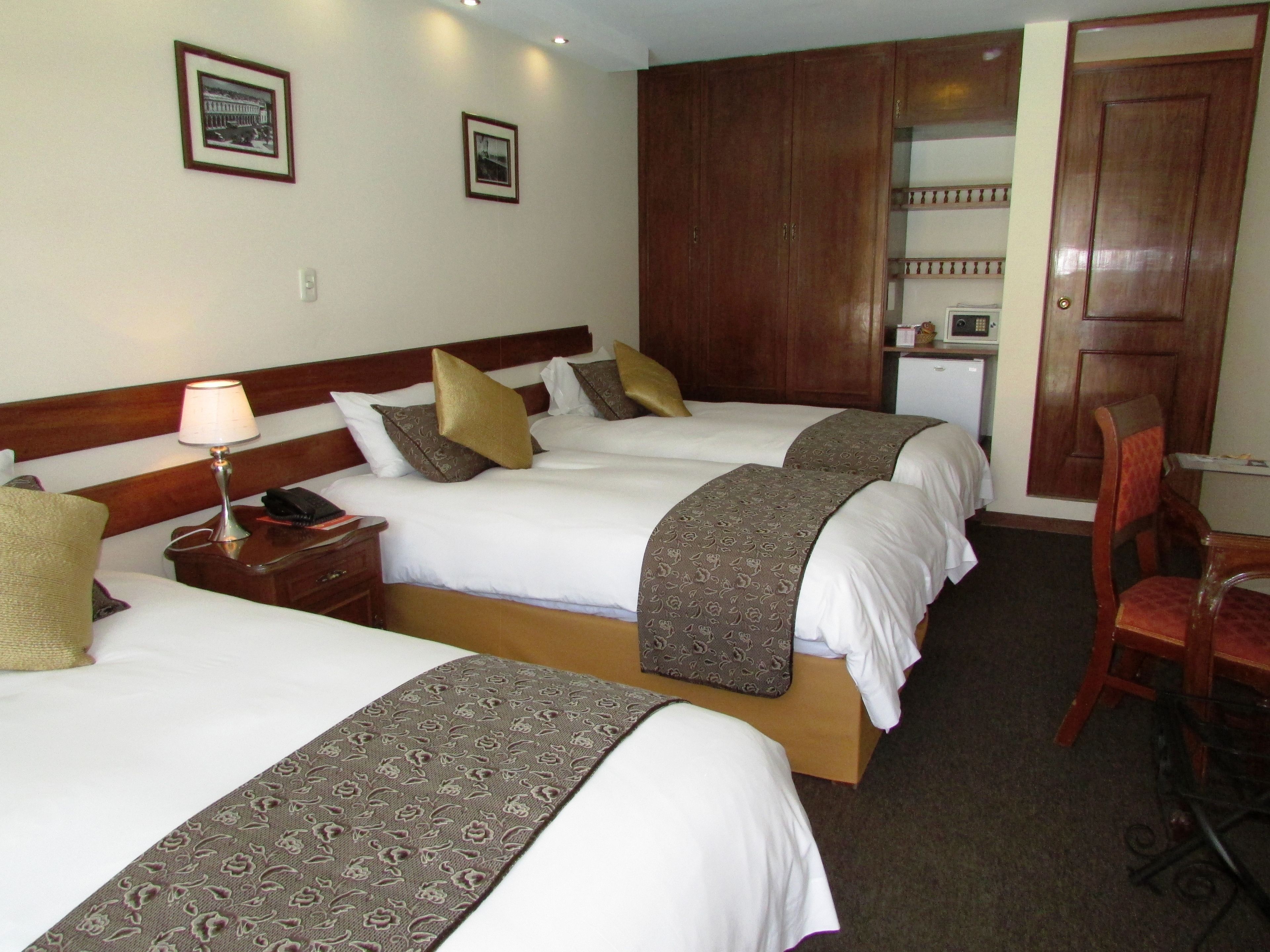 business triple room | down duvets, minibar, in-room safe, desk