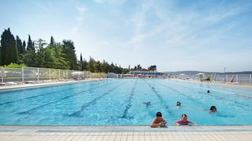 2 indoor pools, seasonal outdoor pool, pool umbrellas