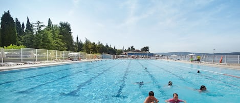 2 indoor pools, seasonal outdoor pool, pool umbrellas