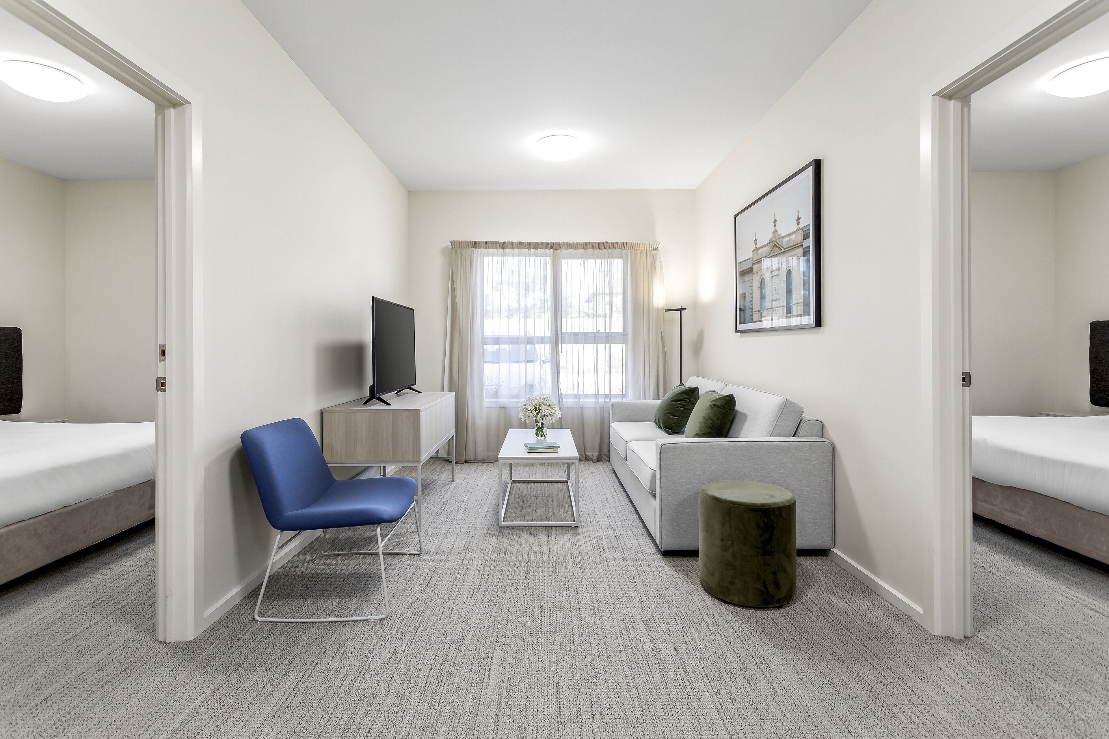 two bedroom apartment | living area | 50-inch smart tv with digital channels