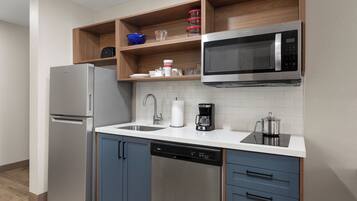 Premium bedding, desk, laptop workspace, iron/ironing board