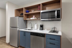 Premium bedding, desk, laptop workspace, iron/ironing board