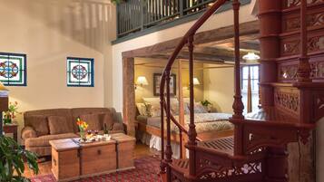 Deluxe Suite, 1 King Bed, Fireplace | Premium bedding, down duvets, individually furnished, iron/ironing board