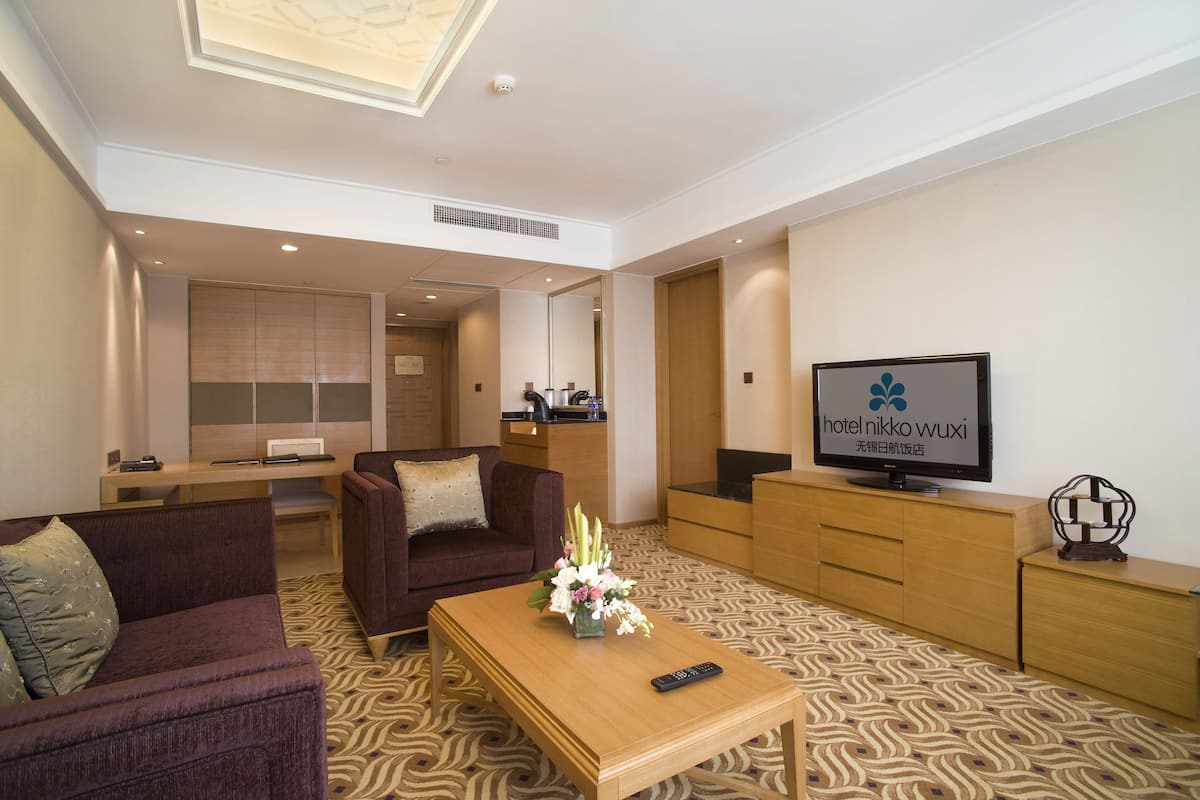 Deluxe suite | Select Comfort-bedden, een minibar, een kluis op de kamer