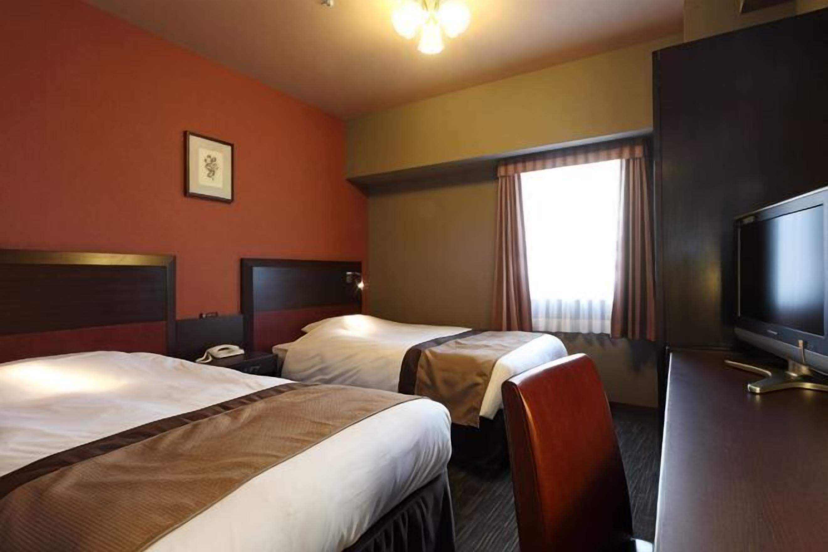 Down comforters, desk, free WiFi, bed sheets
