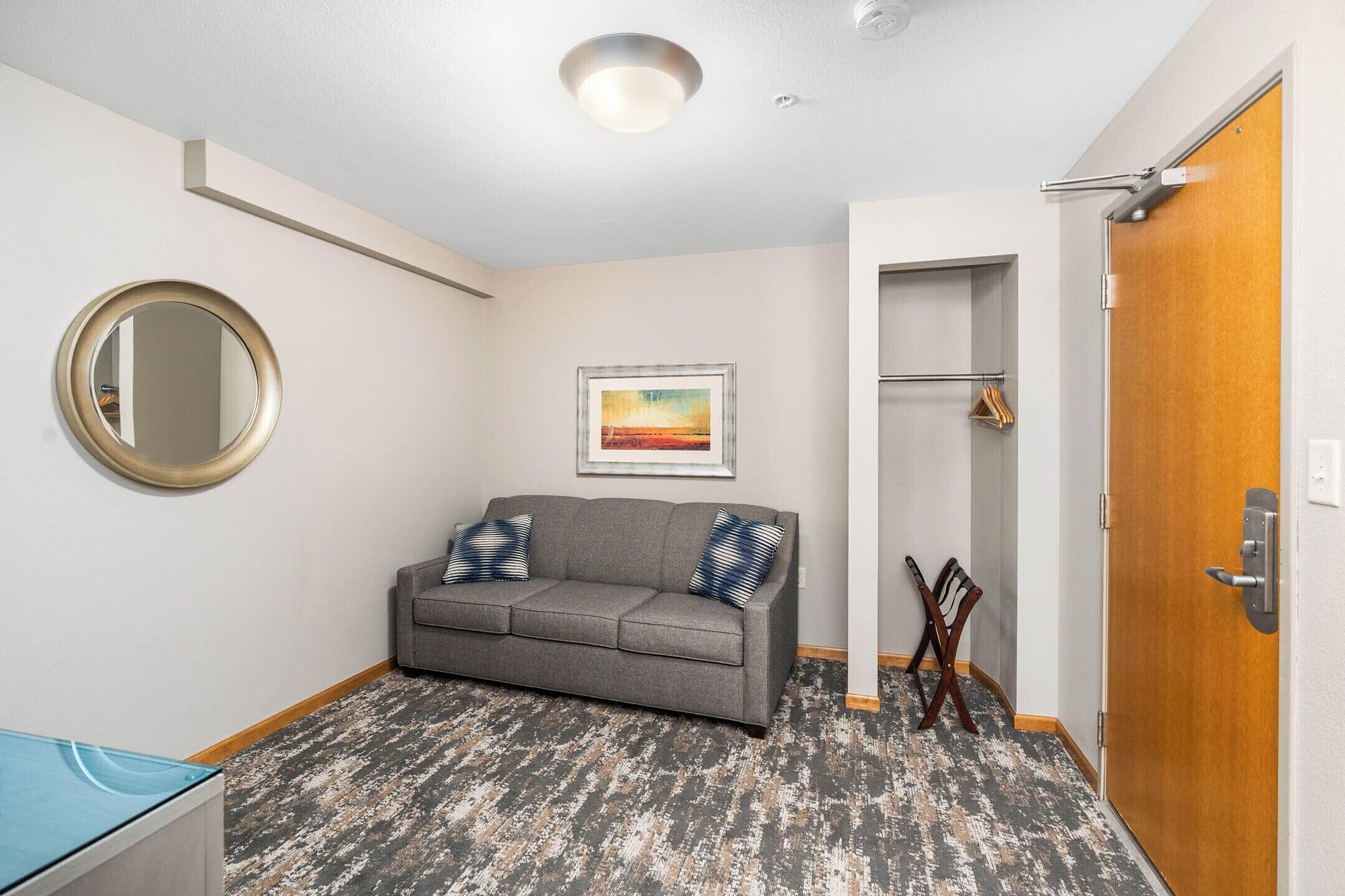 suite, 1 bedroom, lake view | living area | flat-screen tv