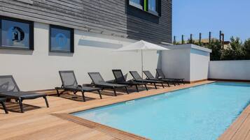 Outdoor pool, pool umbrellas, pool loungers