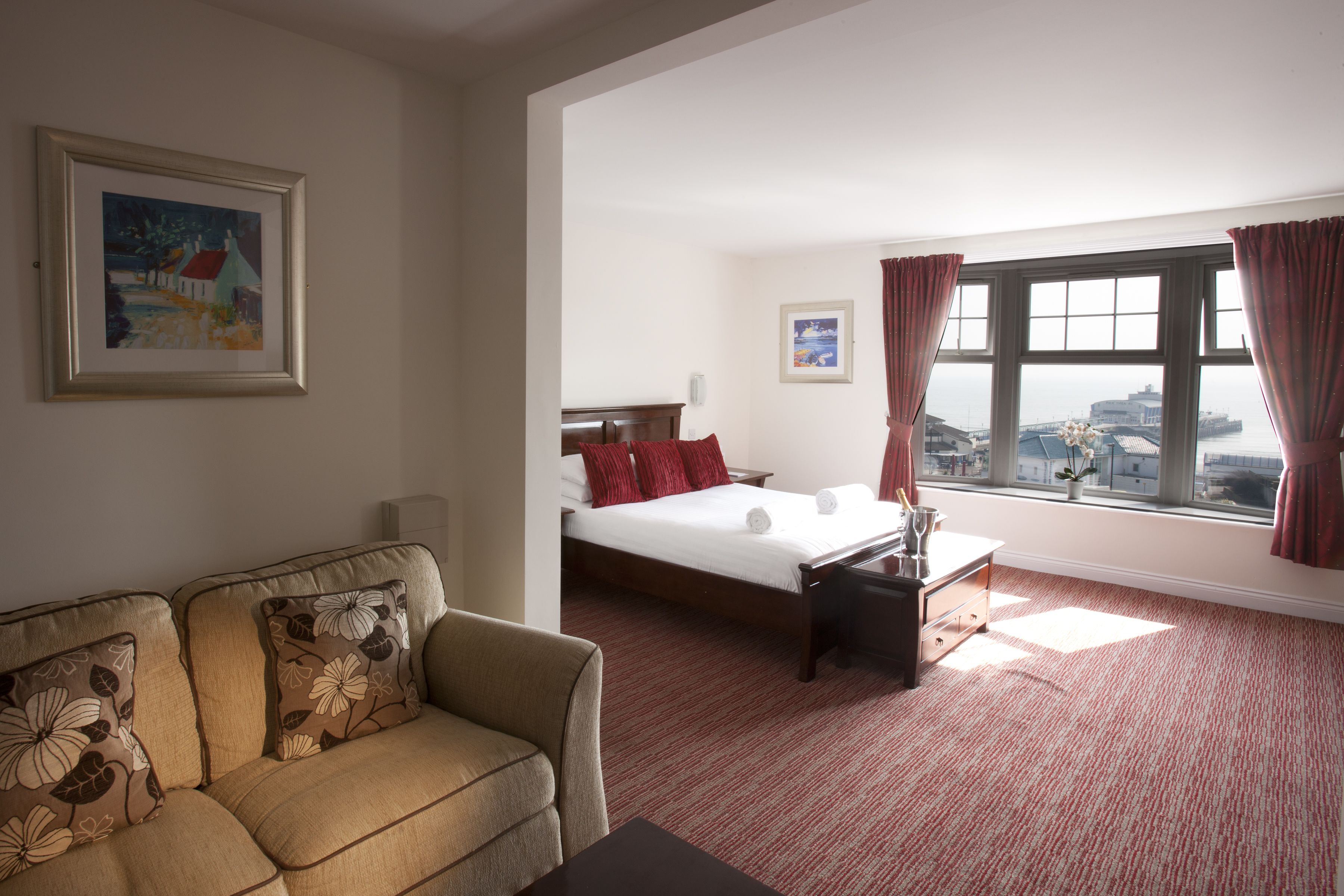 signature room | in-room safe, desk, blackout curtains, iron/ironing board