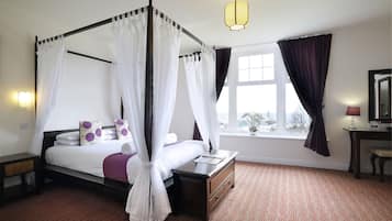 Signature Room | In-room safe, desk, blackout curtains, iron/ironing board