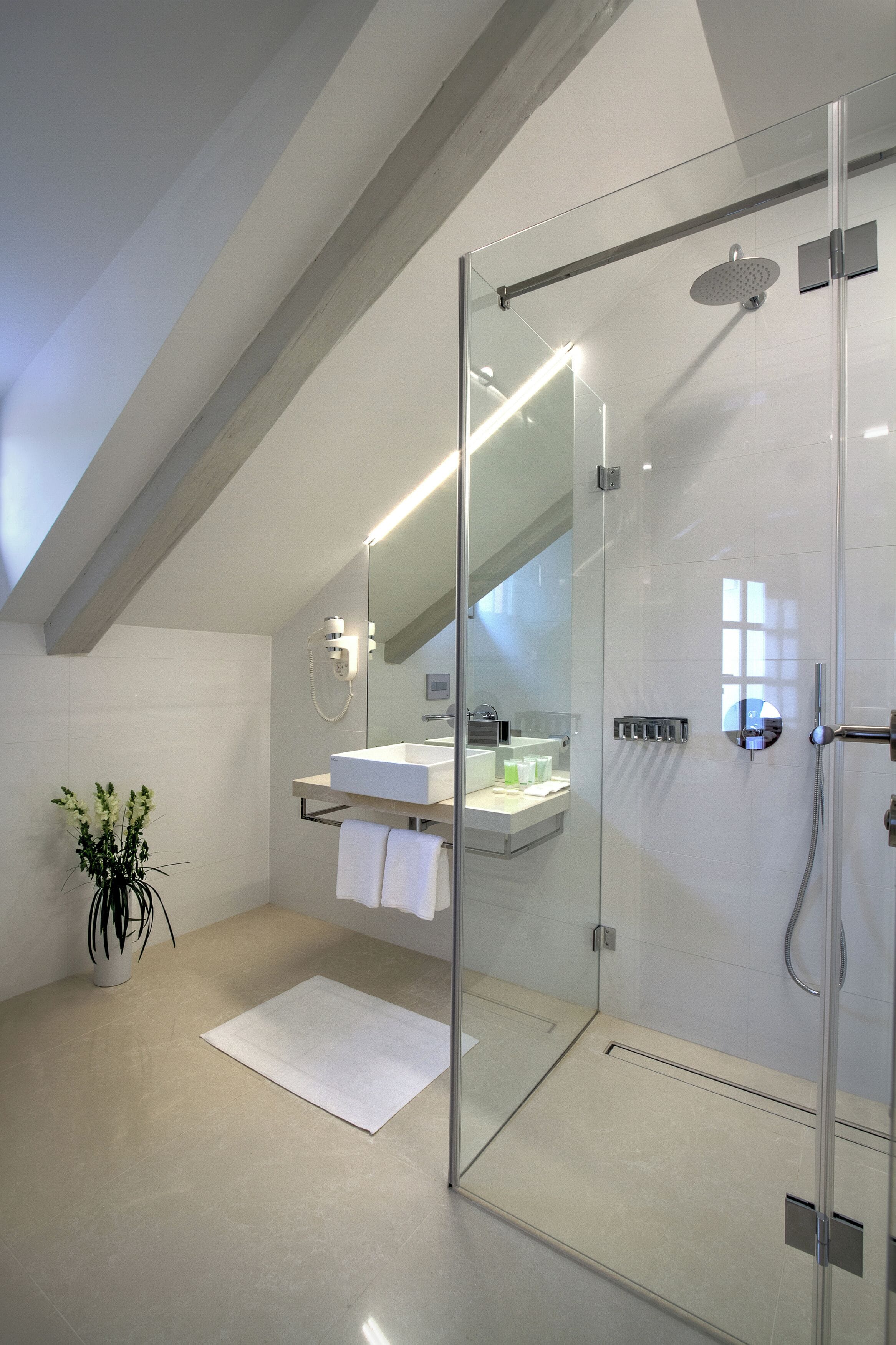 deluxe double room | bathroom | designer toiletries, hair dryer, towels, shampoo