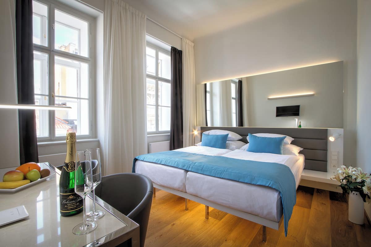 standard double room | premium bedding, minibar, in-room safe, individually decorated