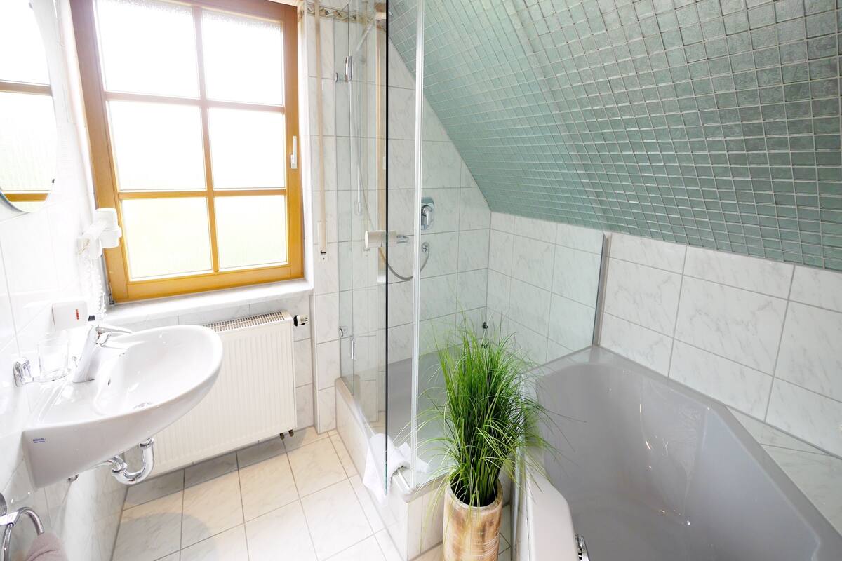 studio suite | bathroom | free toiletries, hair dryer, bathrobes, slippers