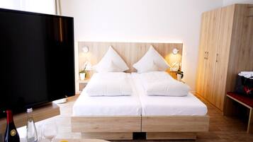 Hypo-allergenic bedding, in-room safe, desk, laptop workspace