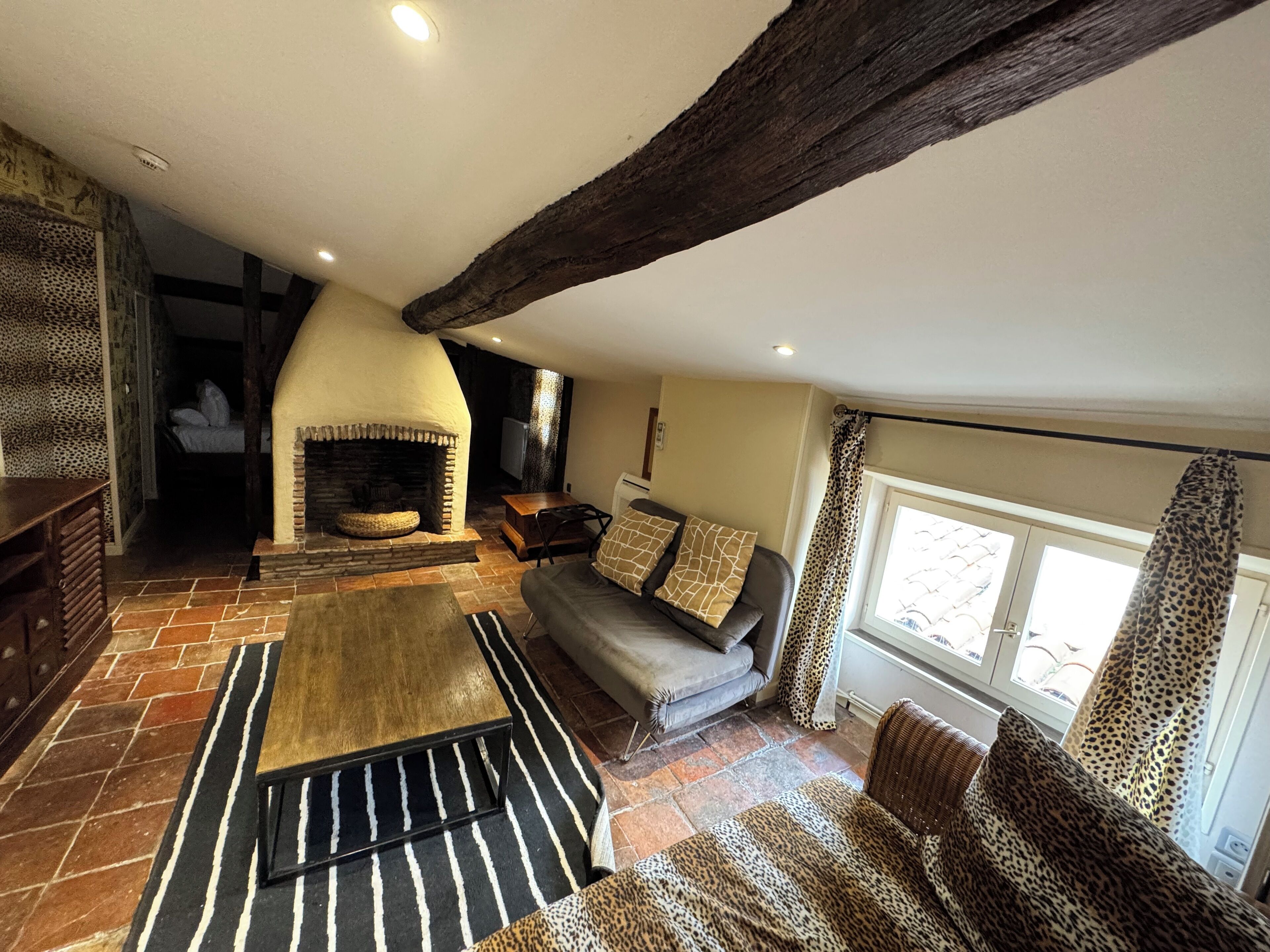 Family Quadruple Room | Living area | Flat-screen TV