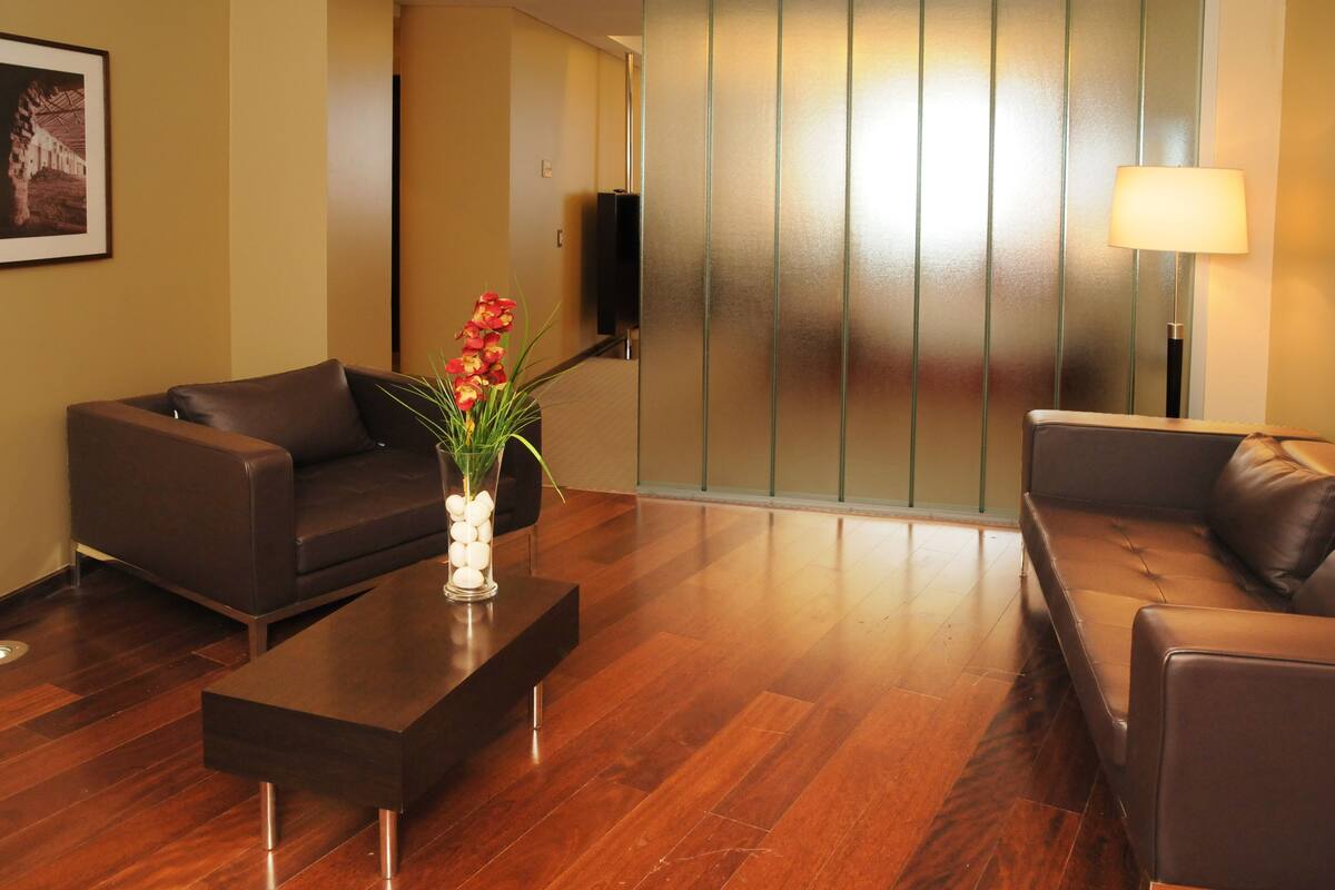 junior suite | bathroom | combined shower/bathtub, jetted bath, rainfall showerhead