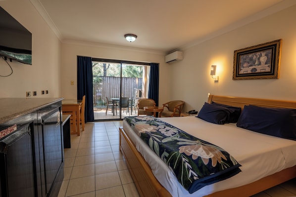 Desk, laptop workspace, blackout curtains, iron/ironing board