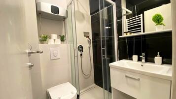 Exclusive Apartment, 2 Bedrooms | Bathroom | Shower, free toiletries, hair dryer, slippers