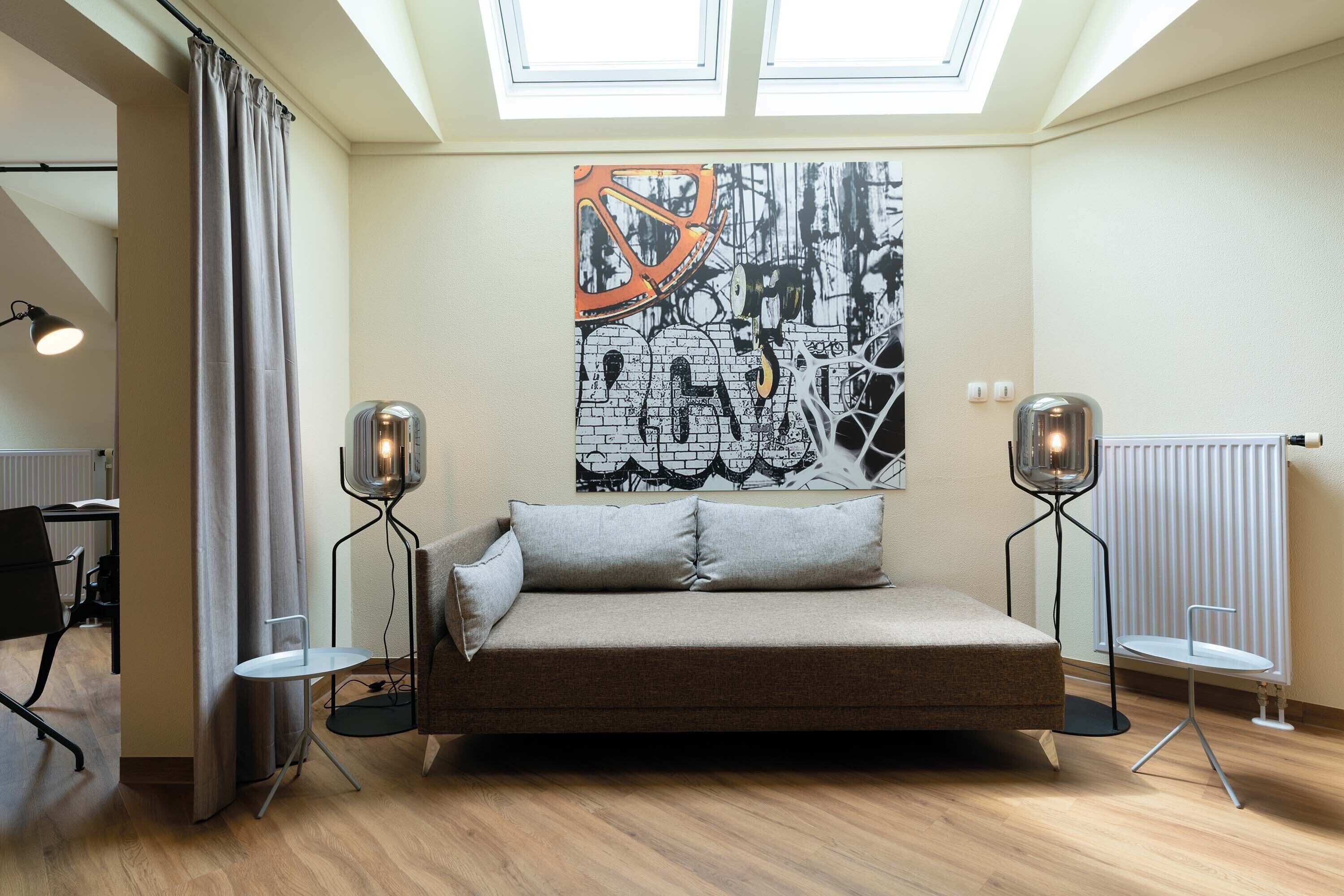 suite | living area | flat-screen tv