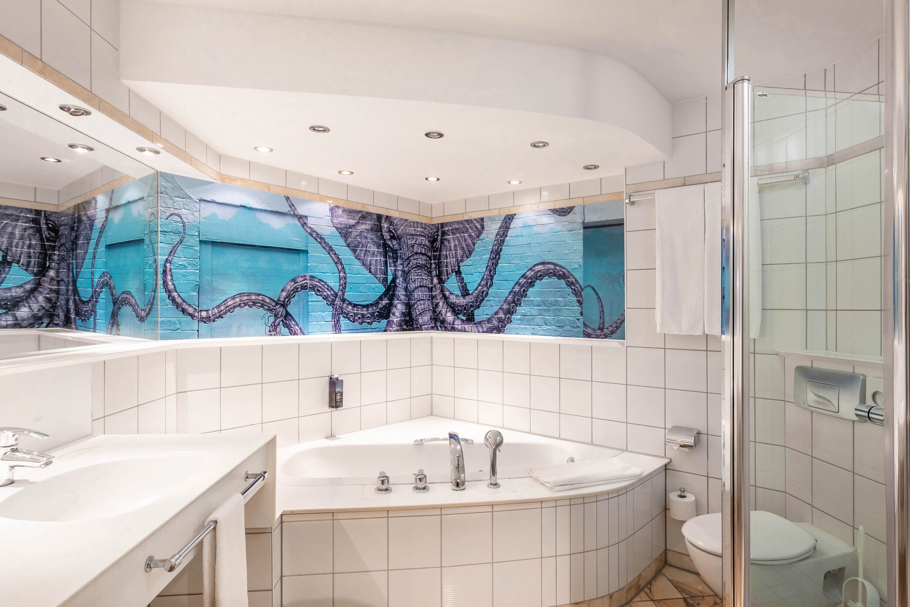 suite | bathroom | eco-friendly toiletries, hair dryer, towels