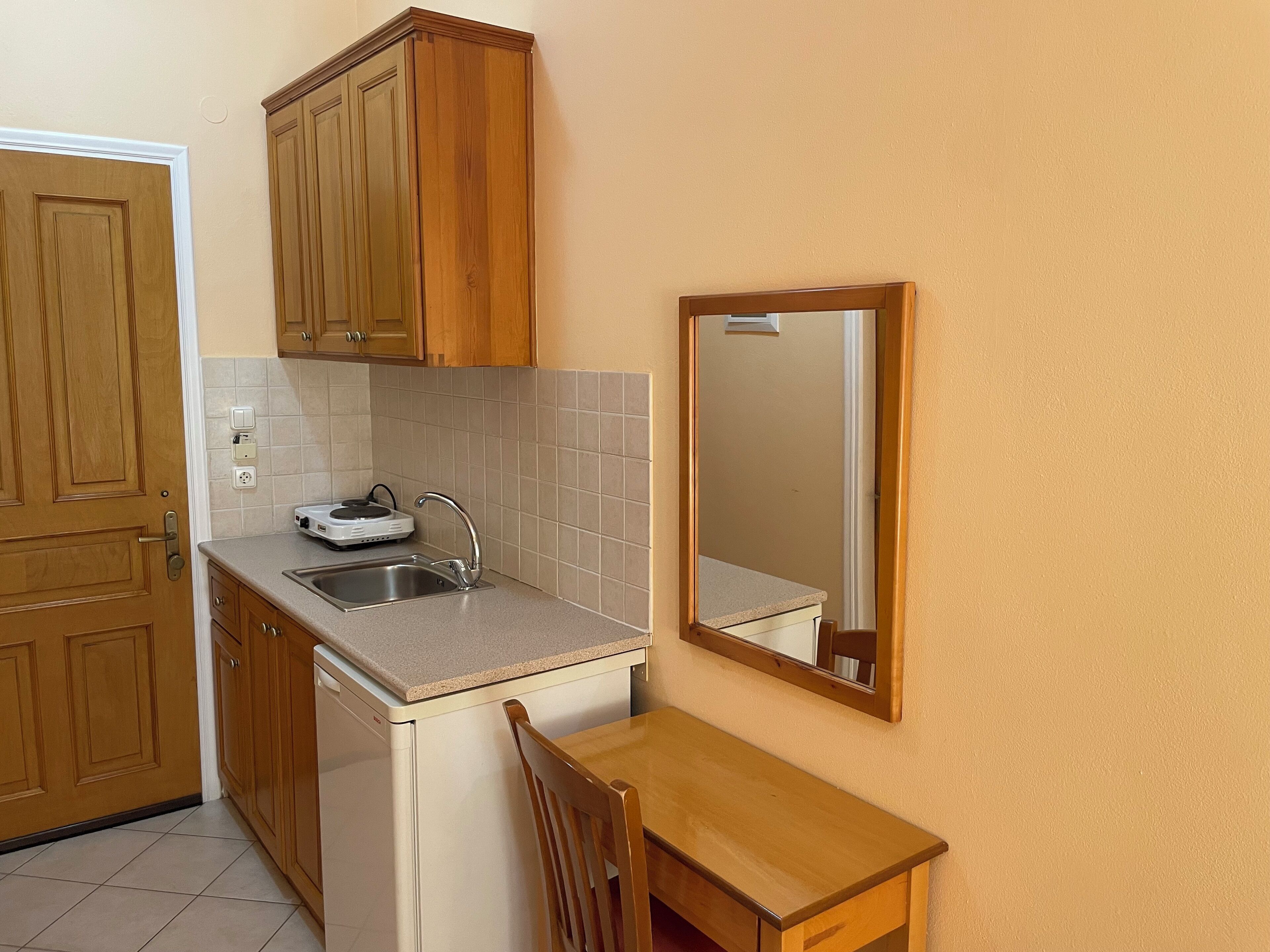 twin room, sea view | private kitchen | fridge, electric kettle, dining tables