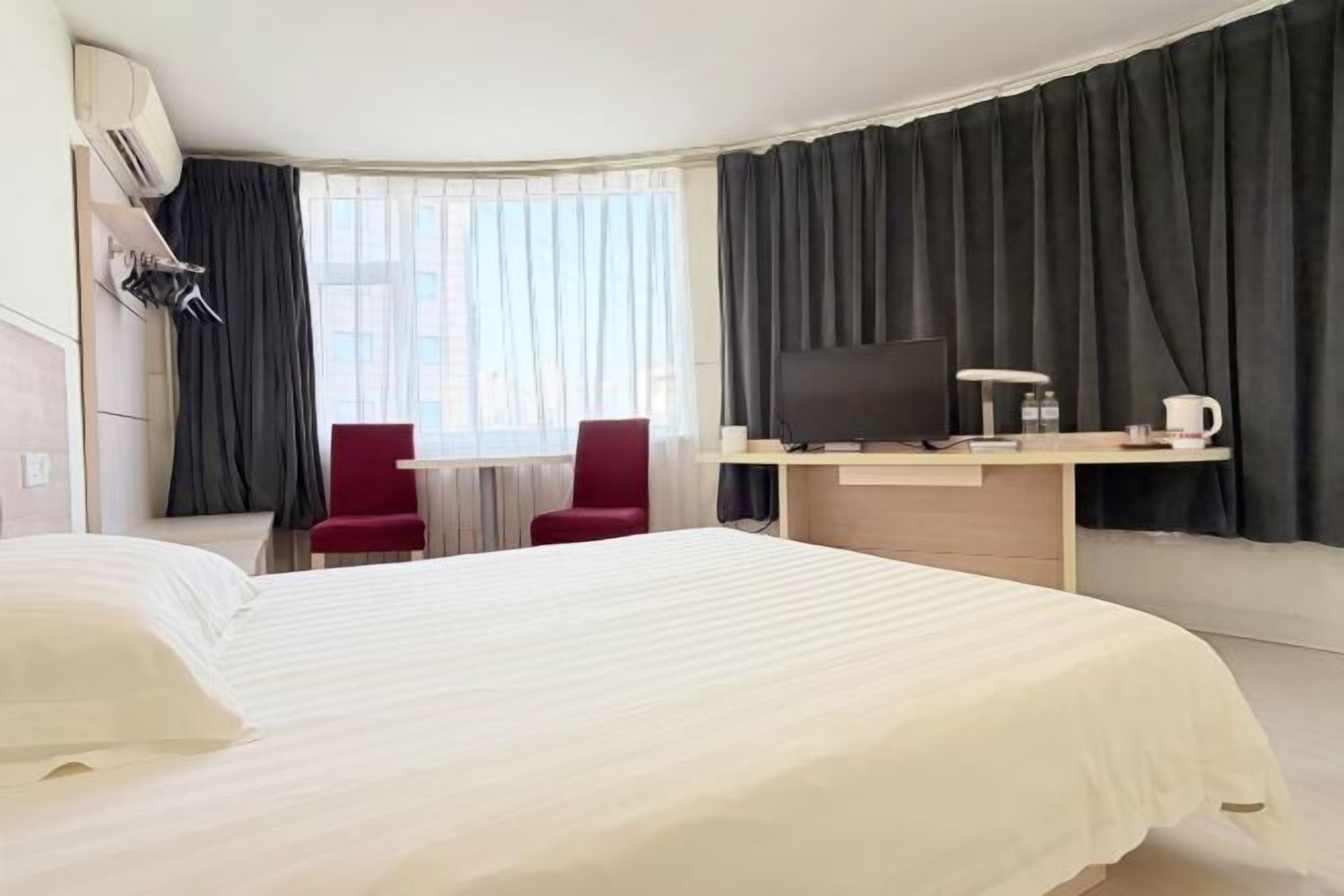 In-room safe, desk, blackout curtains, iron/ironing board (on request)