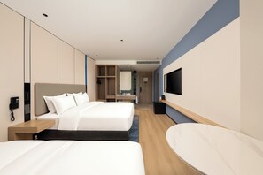 Premium bedding, down duvets, desk, laptop workspace
