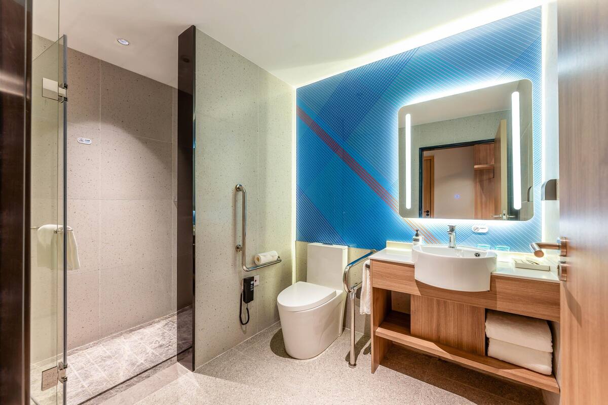 Bathroom | Shower, free toiletries, hair dryer, slippers